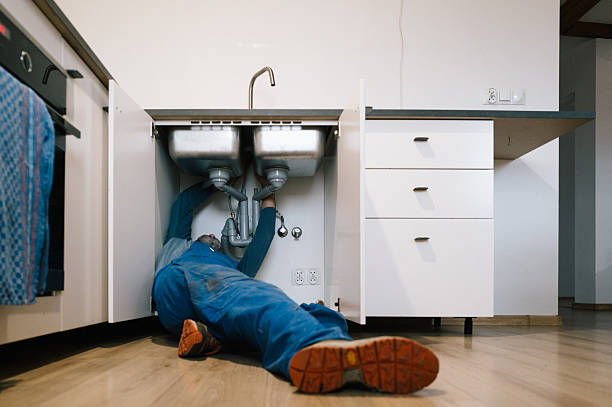 Professional Drain Cleaning technician working in Burton, WA